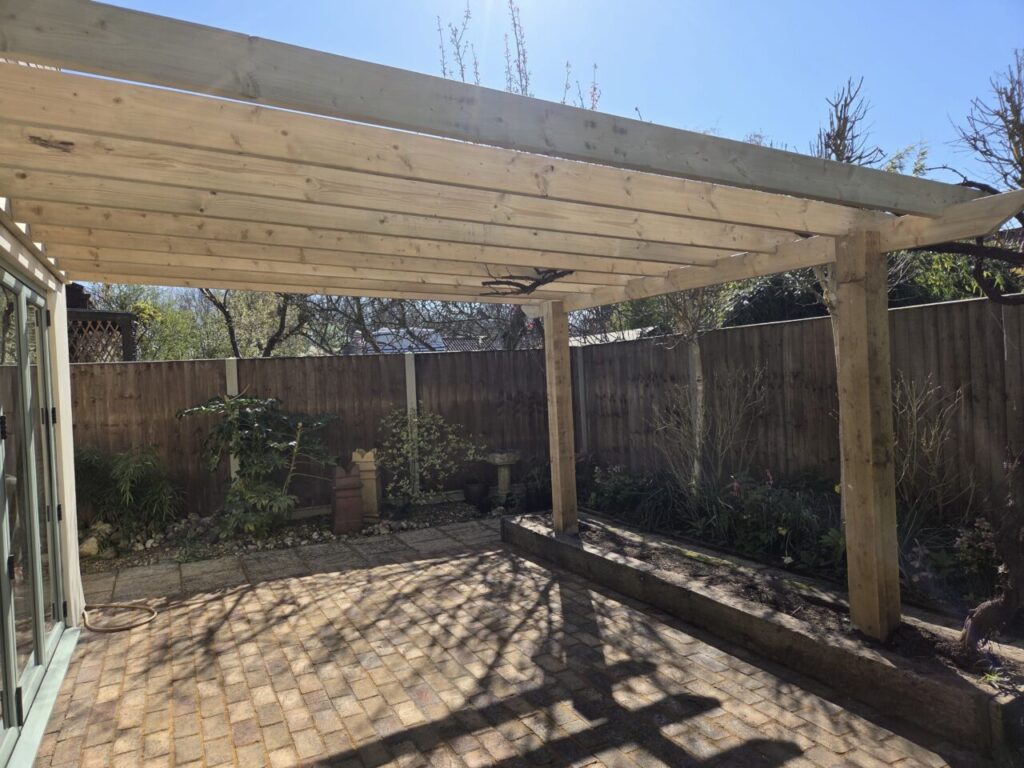 Bespoke timber pergola installed over paved patio