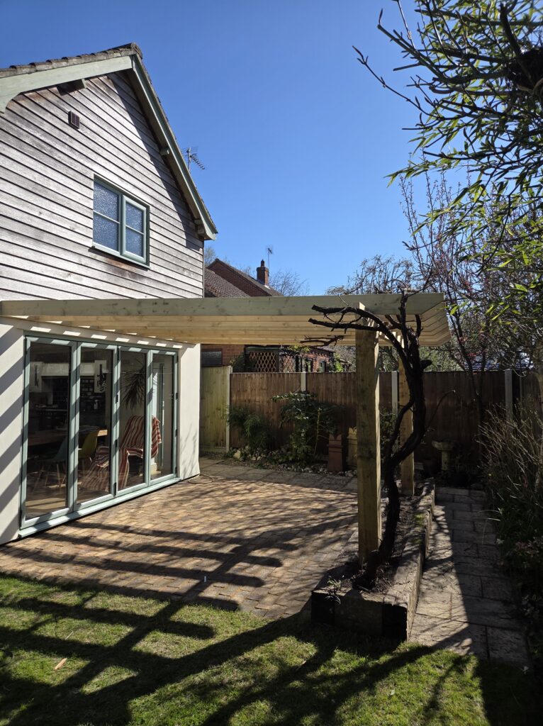 Professionally installed timber pergola over paved patio