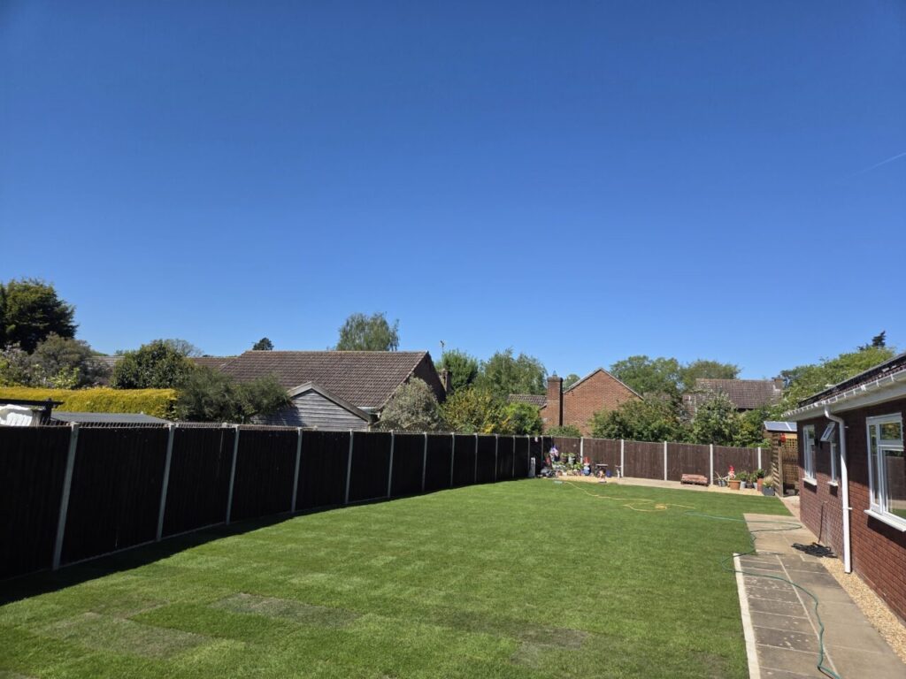 Newly refurbished levelled lawn with fresh turf